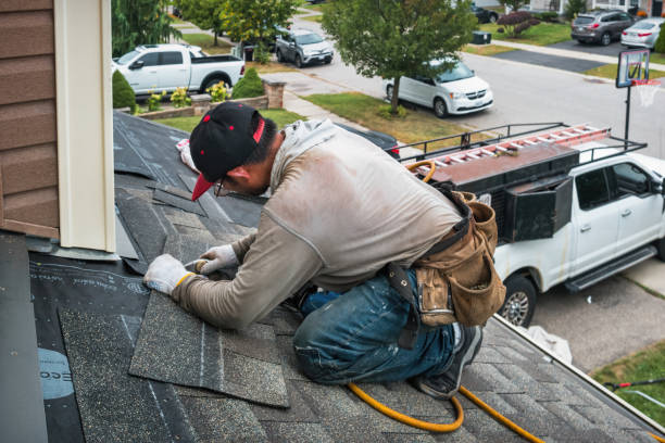 Professional Roofing technician working in Raeford, NC